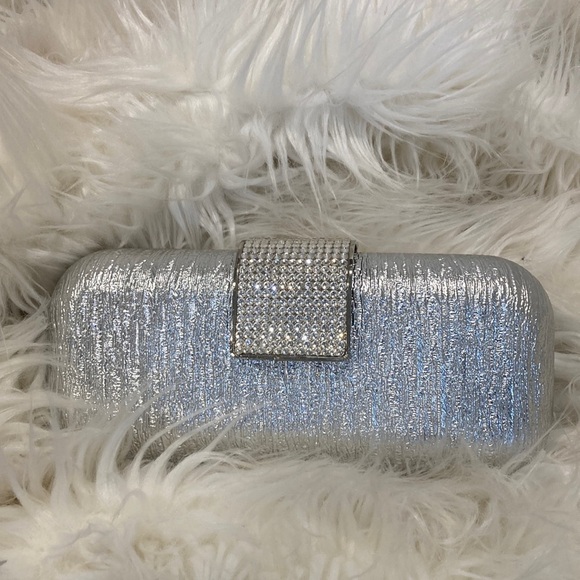 Charming Charlie Handbags - Charming Charlie Silver Clutch Evening Bag